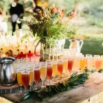 Refreshing drinks table at a bush wedding reception in Limpopo, South Africa, ideal for wildlife wedding venues with natural elegance.